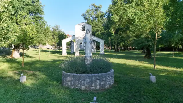 Statue of Our Lady surrounded by lavender